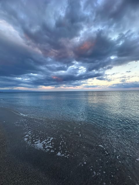 On the beach, black sand, 2 beach bars