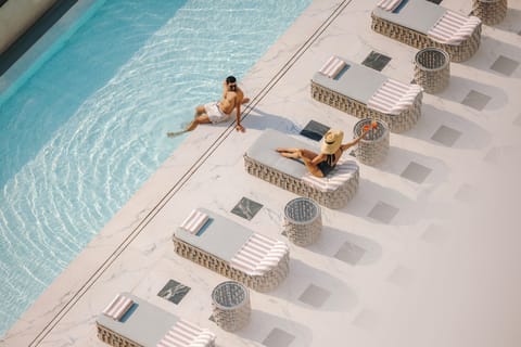 Outdoor pool, pool umbrellas, sun loungers
