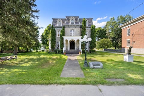 Step into timeless elegance—your stay begins at these iconic front steps.