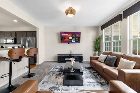 Open living and kitchen area designed for easy meal preparation