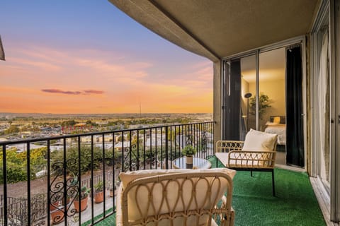 Relax on your private balcony with calming San Diego views.
