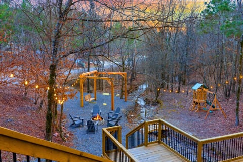 This is as cozy as it gets! Swings around the firepit area in a secluded forest setting