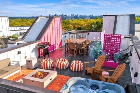 Enjoy breathtaking downtown views from your private rooftop oasis, complete with a hot tub, fire pit, grill, and plenty of seating—perfect for relaxing after a night on Broadway!