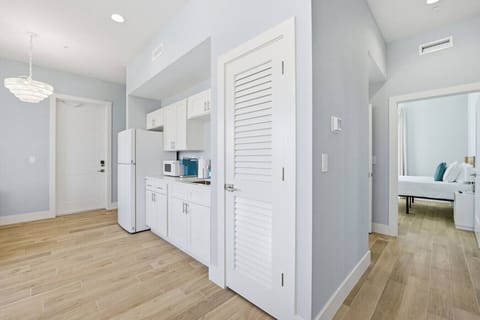 Modern kitchenette with sleek finishes and thoughtful touches
