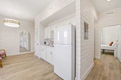 Modern kitchenette with sleek finishes and thoughtful touches