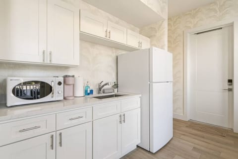 Stylish mini kitchen with thoughtful touches.