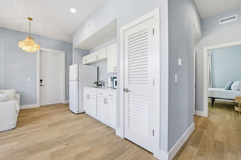 Modern kitchenette with sleek finishes and thoughtful touches