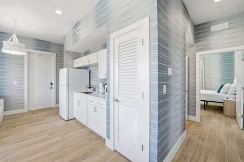 Modern kitchenette with sleek finishes and thoughtful touches