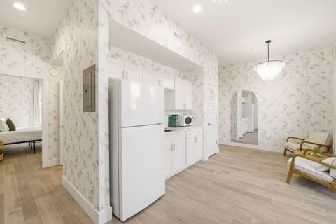 Modern kitchenette with sleek finishes and thoughtful touches