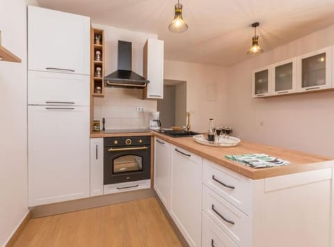 Villa (Heated Pool Retreat) | Private kitchen | Fridge