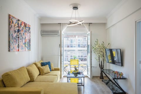 Apartment, 4 Bedrooms | Living area | Flat-screen TV