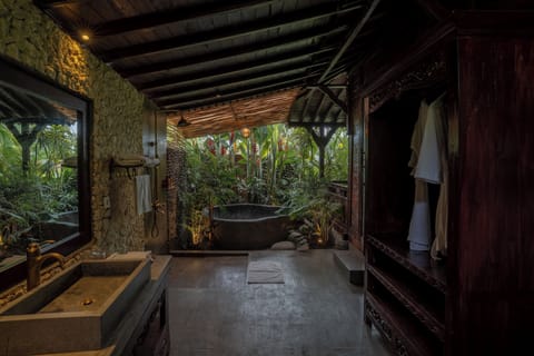 Aksmi Wooden Suite with Balcony | Bathroom | Separate tub and shower, hair dryer, towels, soap