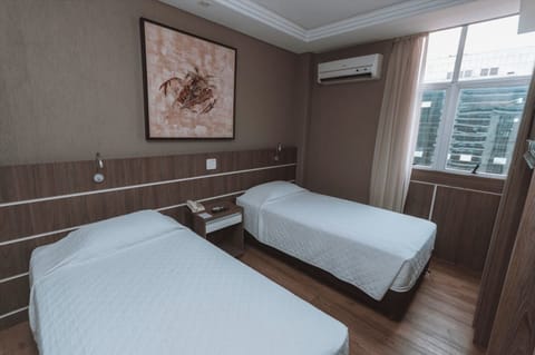 Unwind in crisp twin beds after a busy day.