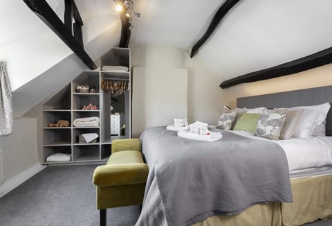 Bedroom on the second floor with a super-king size zip-and-link bed and en-suite shower room