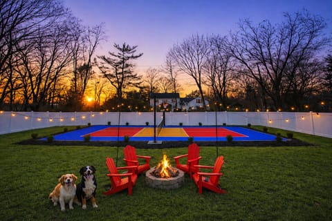 Your private backyard retreat—court, firepit, and space for family, friends & pups