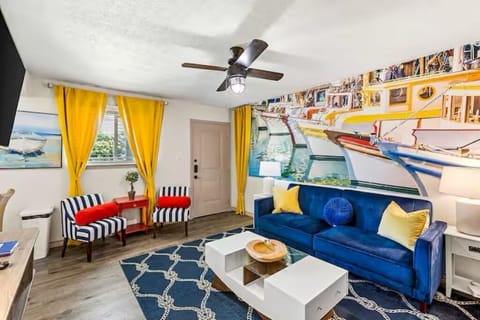 Relax in this bright and cozy living room featuring a smart TV and pull-out bed—perfect for couples, families with kids, or guests traveling with pets.