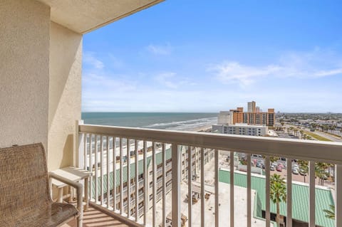 Take in sweeping ocean views from your private balcony during your beach stay. Relax with morning coffee, enjoy coastal breezes, and watch the waves roll in from this elevated beachfront retreat.