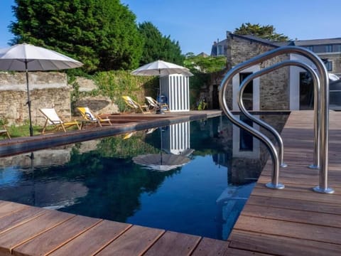 Outdoor pool, open 9:00 AM to 8:00 PM, pool umbrellas, sun loungers