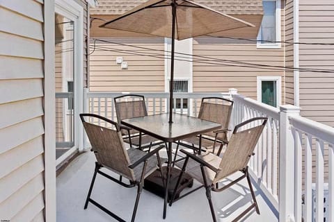 Outdoor dining area by the balcony