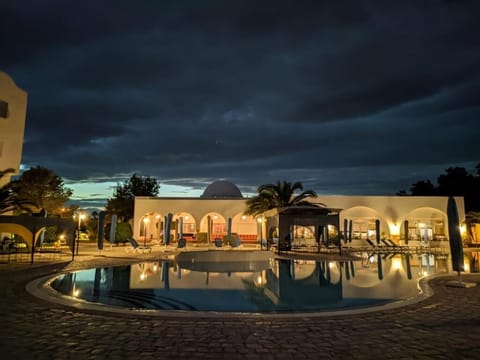 Indoor pool, outdoor pool, pool umbrellas, sun loungers