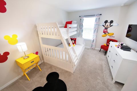 Themed room with bunk beds. 
1 full bed
2 twin beds