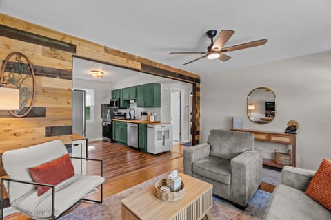 Warm, light‑filled living room for slow mornings, movie nights, reading, and com