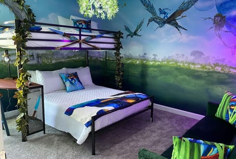 Avatar room with hand painted  mural creates a cool place for up to 4 to sleep