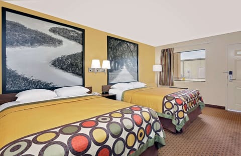 Desk, blackout drapes, iron/ironing board, free cribs/infant beds