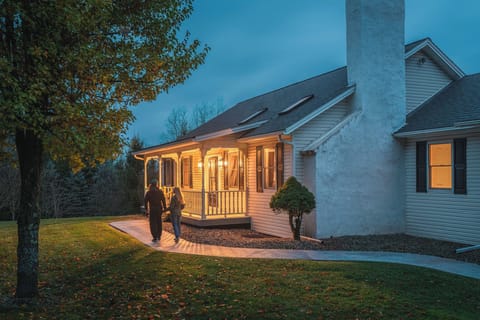 Warm, welcoming front porch perfect for evening relaxation
