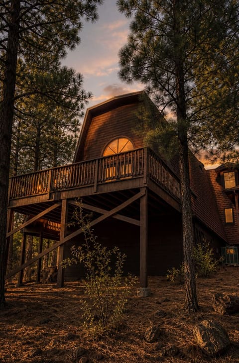 Expansive sunset-view deck at our western A-frame cabin in Arizona’s White Mountains