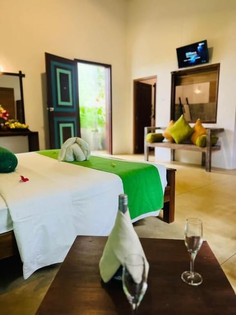 Deluxe Triple Room, Garden View | Room amenity