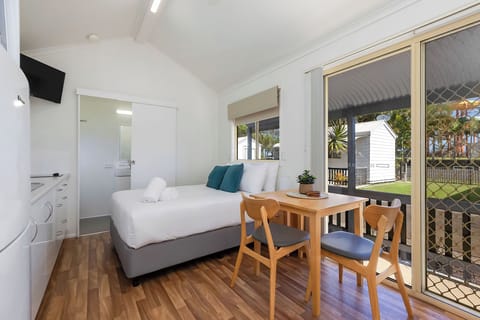 Standard Cabin - Sleeps 2 - Dog Friendly | Living area | 32-inch TV with cable channels