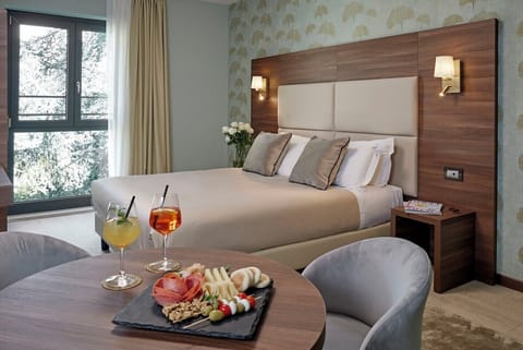 Superior Quadruple Room | Minibar, in-room safe, soundproofing, free WiFi