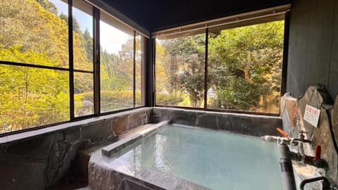 House B - Private Japanese-Style Room (Up to 4 People), Non Smoking | Bathroom | Hair dryer, bidet, towels, shampoo