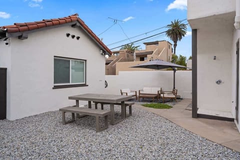 Shared CourtYard Space for The Rosamar Guests: 
Spend more time outside at the Patio area or picnic benches! 
Don't forget to take advantage of the Outdoor Shower to keep Sand out! 
