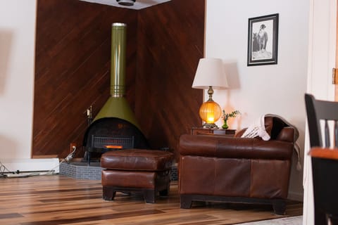 Fireplace fitted with an electric insert that is warm and cozy!
