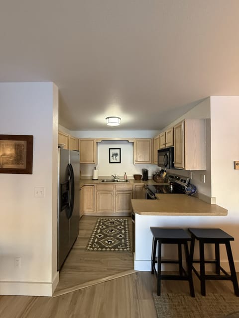 Kitchen with barstool seating for 2