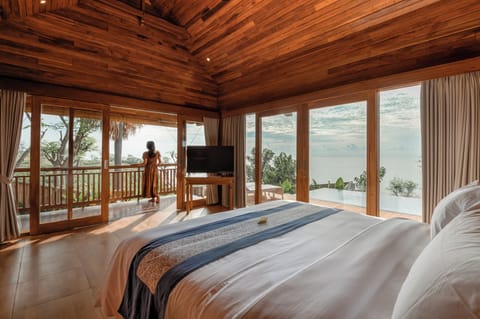Premium Villa, Ocean View | Pillowtop beds, minibar, in-room safe, desk