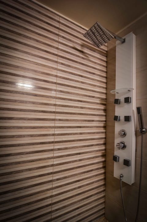 Junior Suite, Sea View | Bathroom | Shower, hair dryer, towels, soap