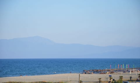 Beach nearby, sun loungers, beach umbrellas