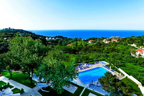 Seasonal outdoor pool, open 11:00 AM to 7:30 PM, sun loungers