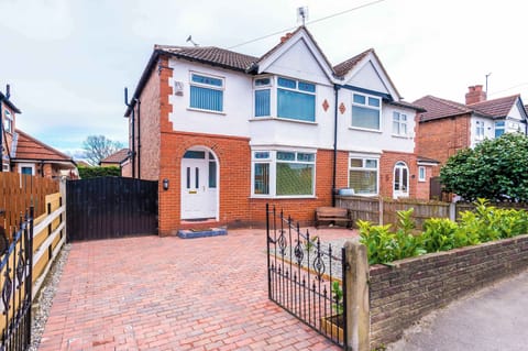 Welcome to this stunning three-bedroom home in Hale with free private parking right outside the front door