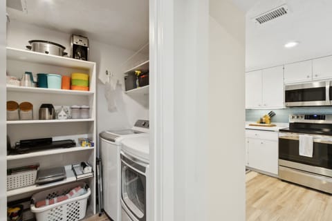 Full size LG Washer & Dryer-This is the laundry area and small appliance storage