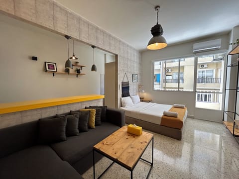 Studio, 1 Double Bed, Balcony, City View | Living area | 43-inch Smart TV with cable channels, streaming services