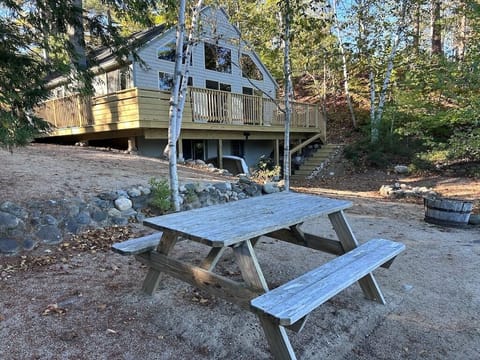 Awesome views with large windows facing the lake & picnic area on the beach