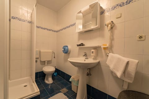 Suite, 2 Bedrooms, Balcony | Bathroom | Shower, free toiletries, hair dryer