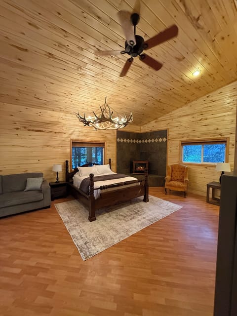 Spacious Master Bedroom with a King Bed and Queen Sofa Sleeper. (View 2)