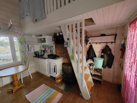 Kitchen and stairs to sleeping loft