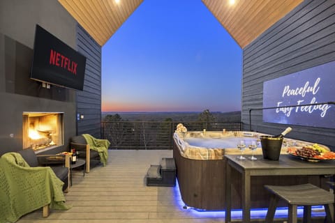 Hot tub with a view, fireplace, and Netflix ready to go — this is how you unwind at Eagle`s Vista.
