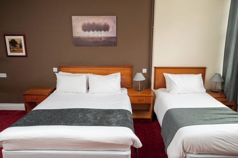 Family Room | Desk, iron/ironing board, free WiFi, bed sheets